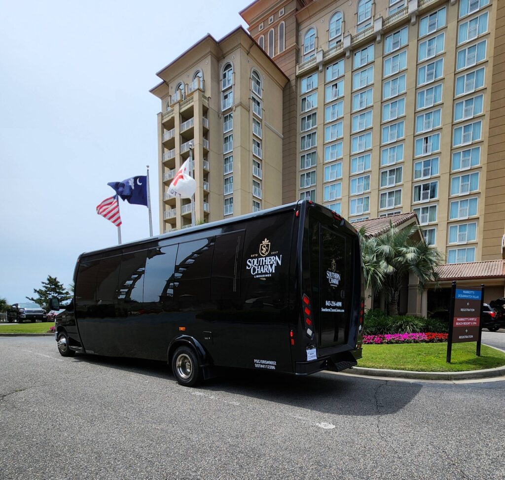 Black Southern Charm limo bus parked at Marriott Myrtle Beach Oceanfront