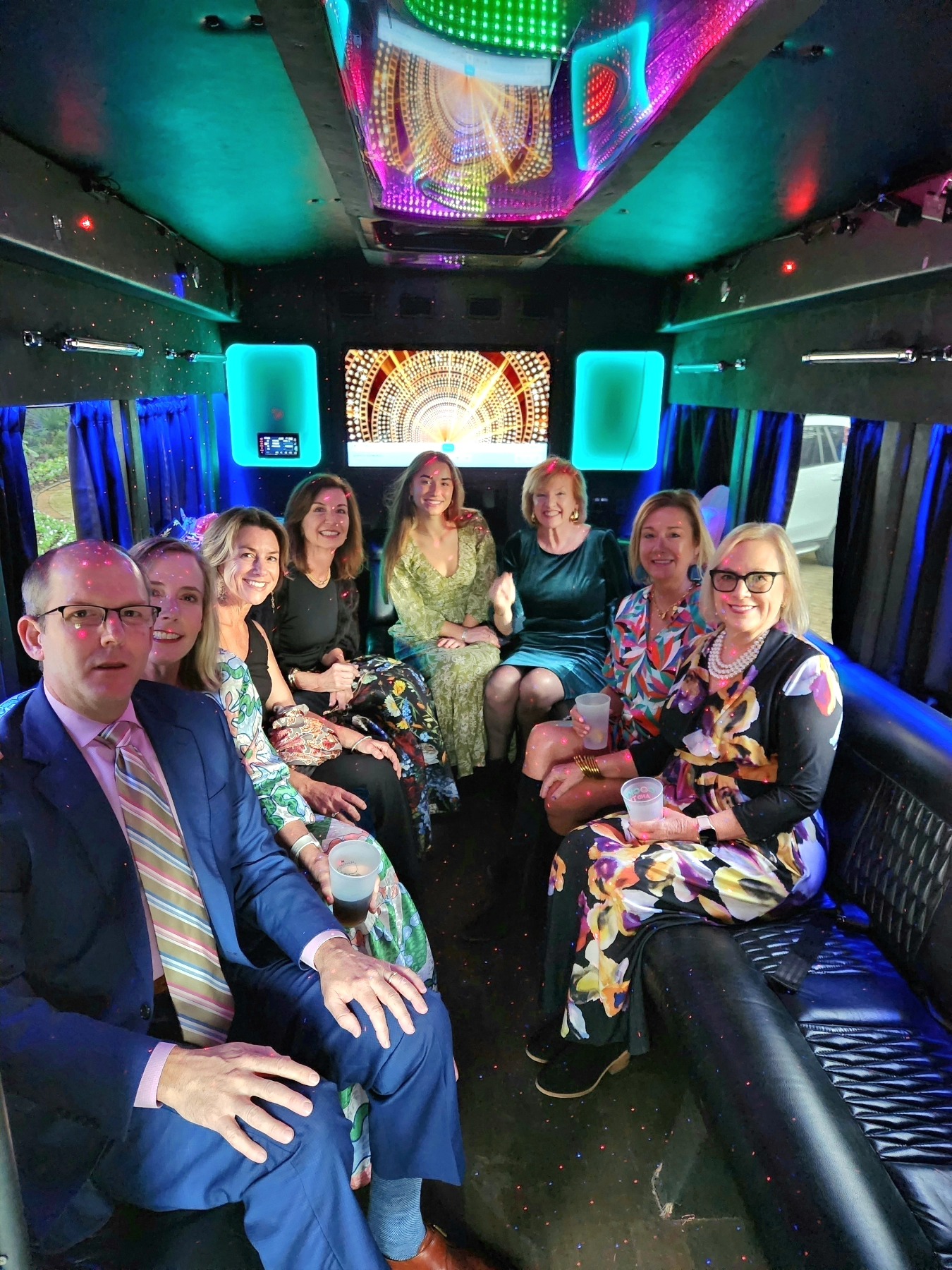 Group celebrating in a party bus rental, ideal for bachelor party limo Myrtle Beach.